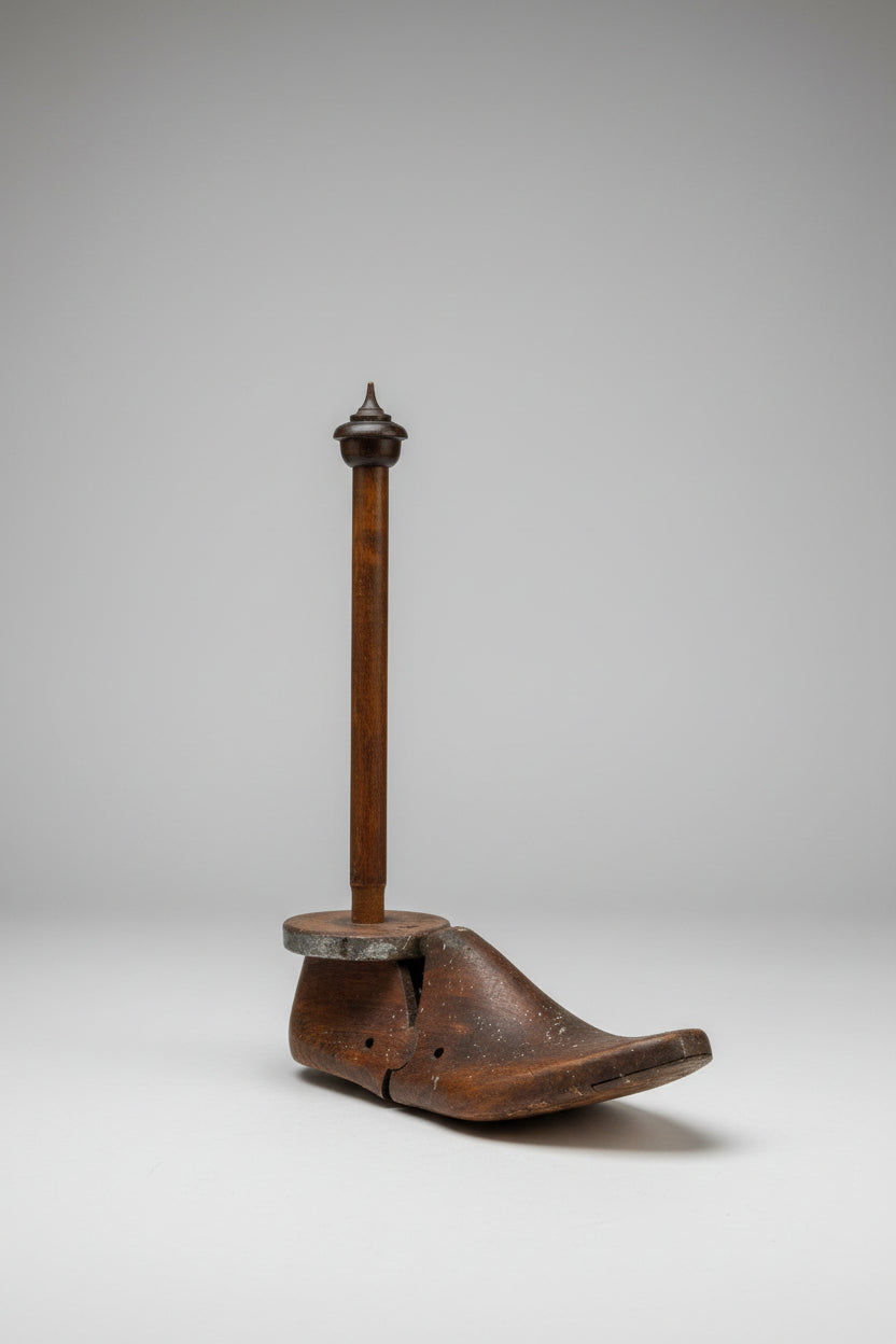 Vintage tools and items on a table with a white tiled wall in the background