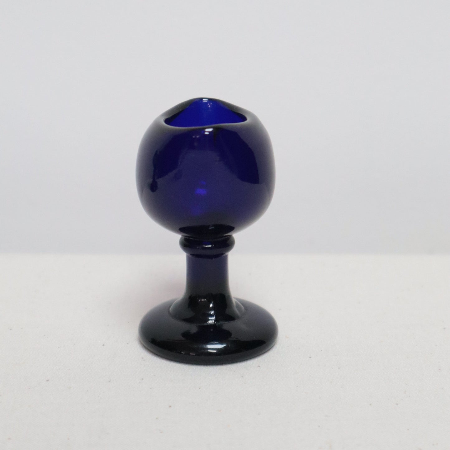 Blue glass bud vase