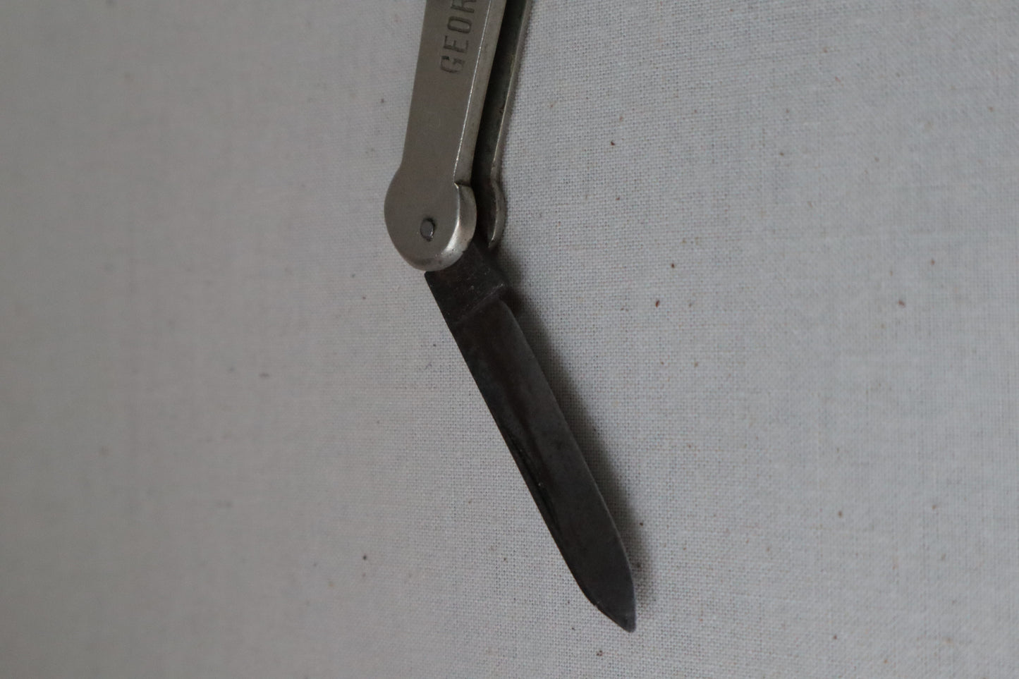 Silvered bottle opener