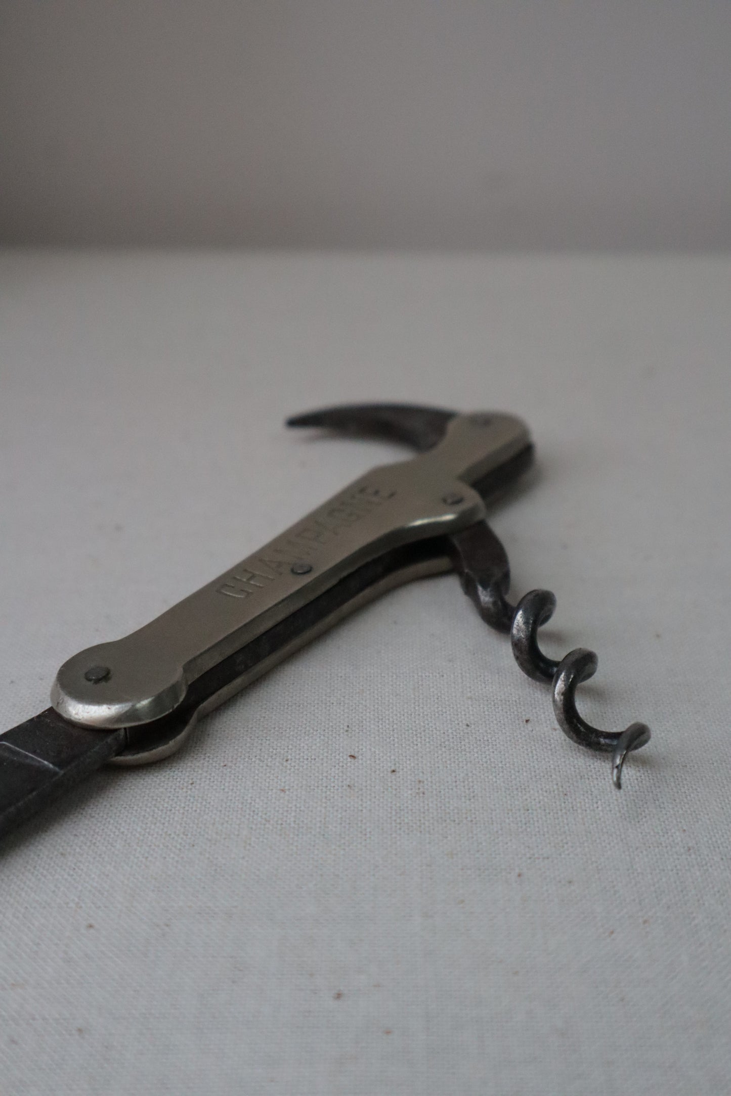 Silvered bottle opener