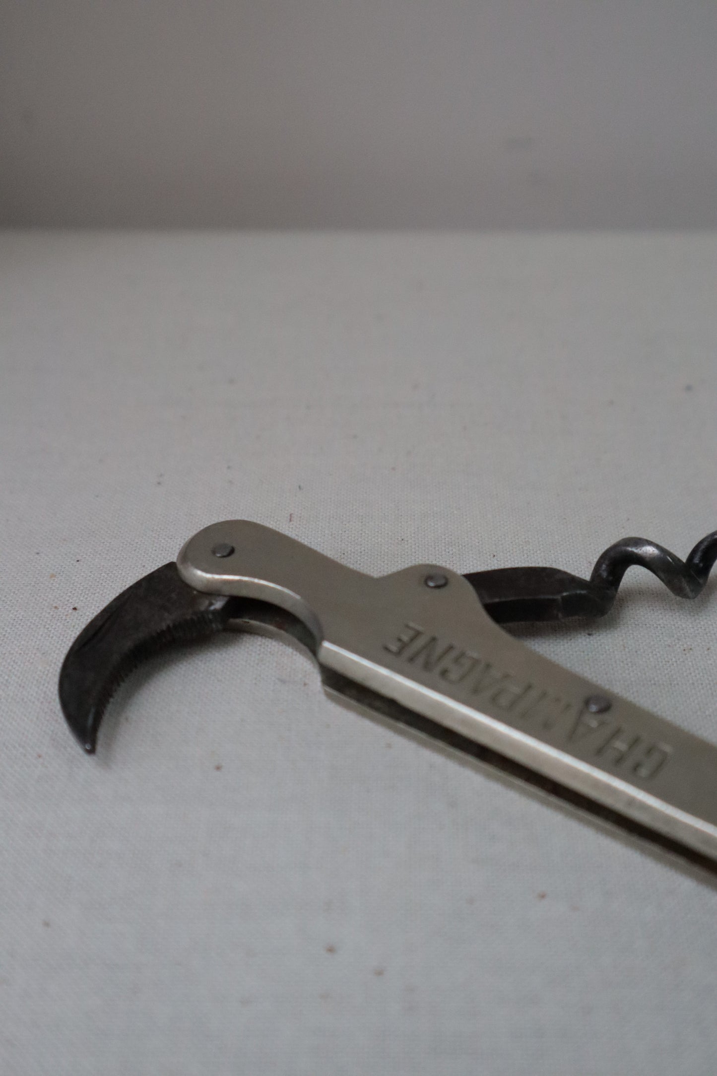 Silvered bottle opener