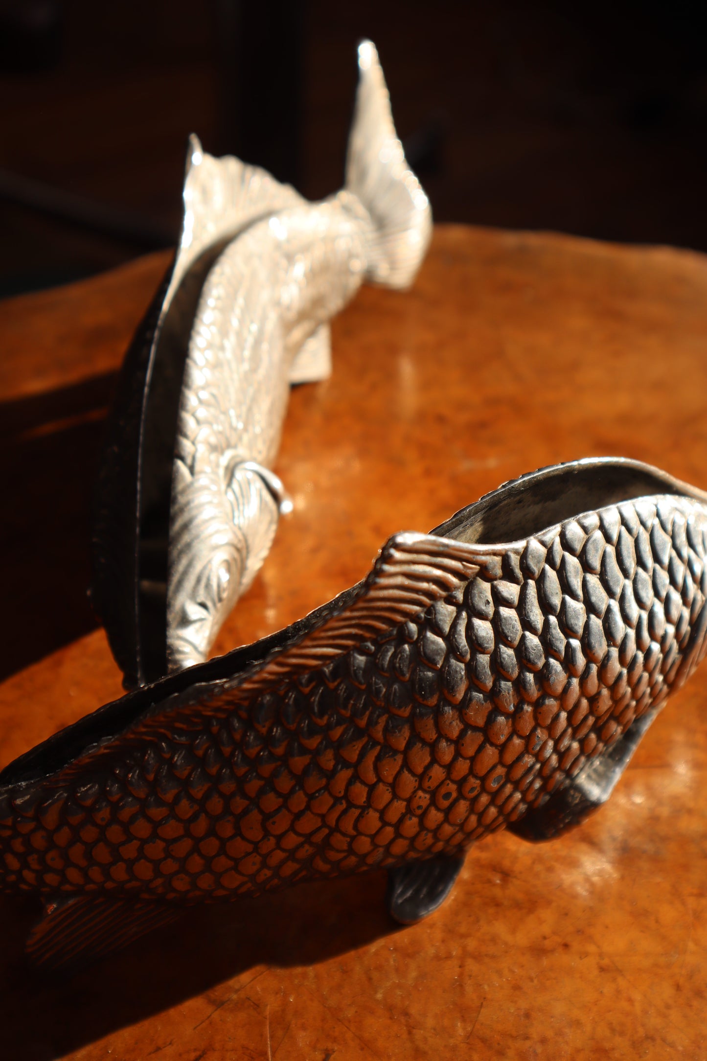 Silvered fish menu holder