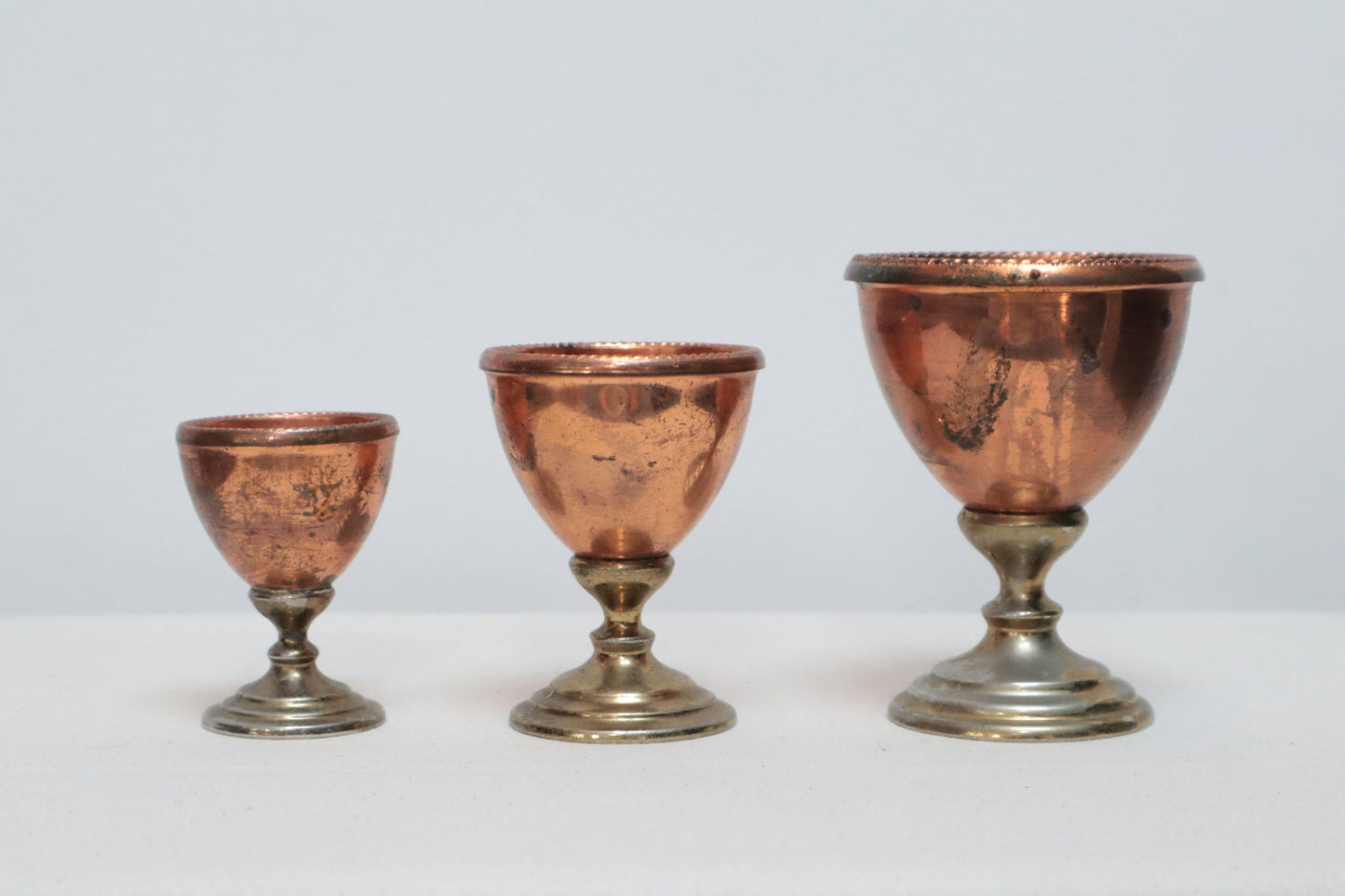 Set of three copper cups