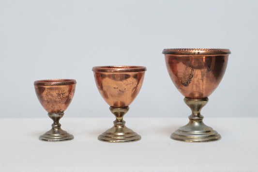 Set of three copper cups