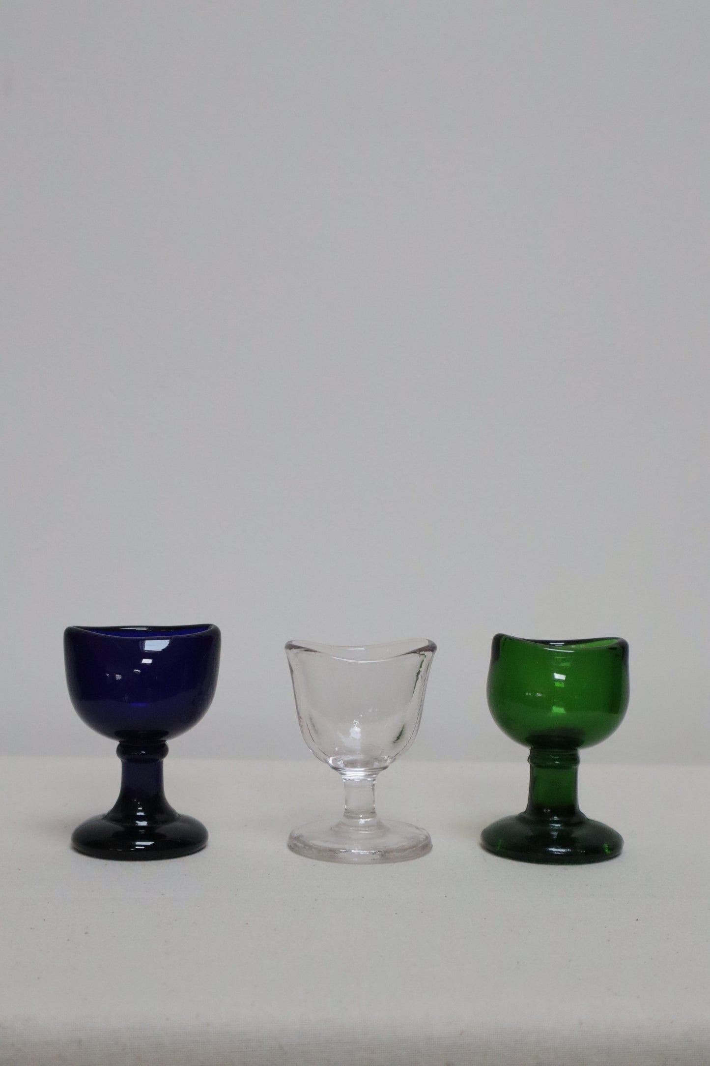 Set of three coloured glasses