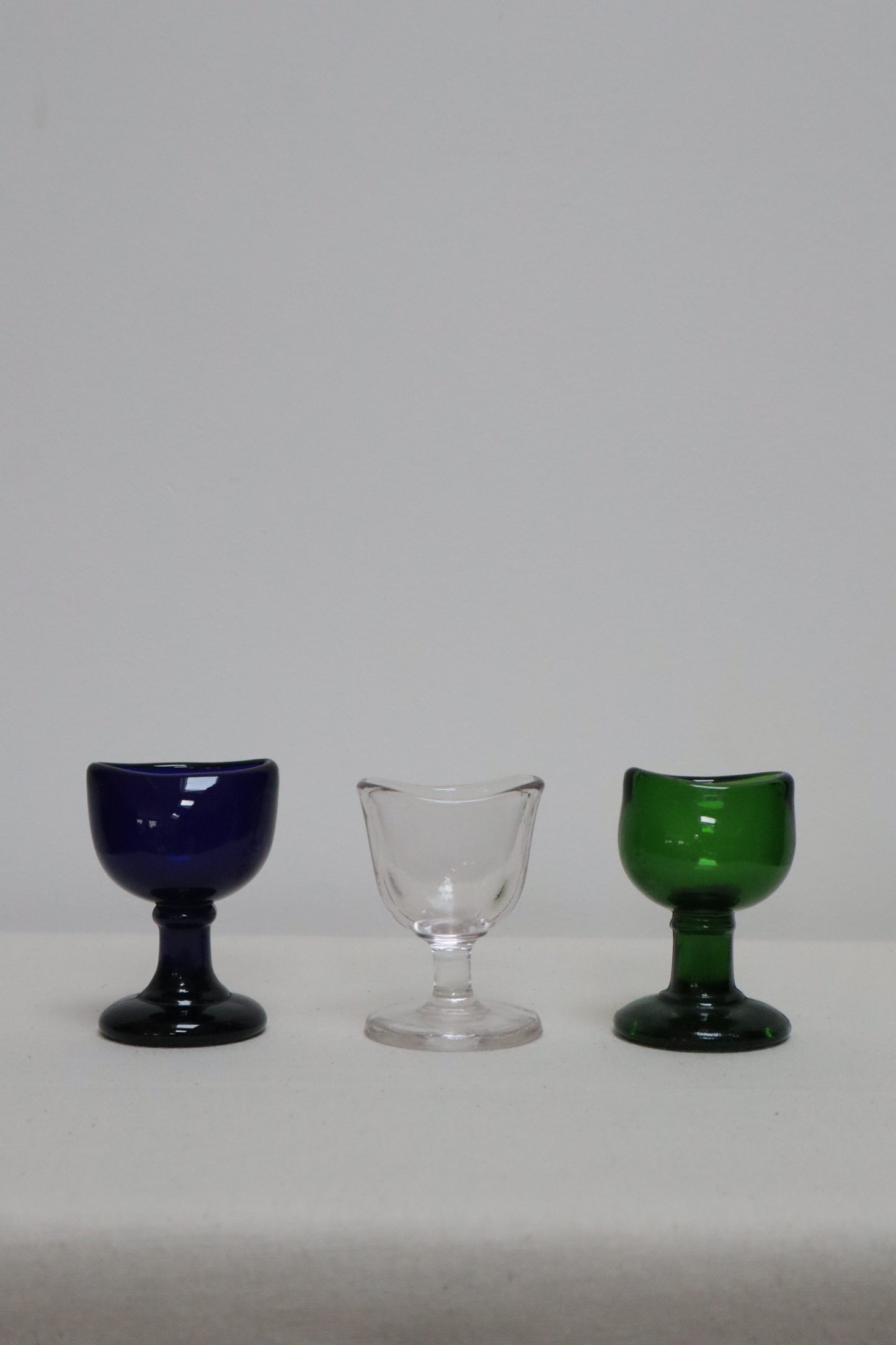 Set of three coloured glasses